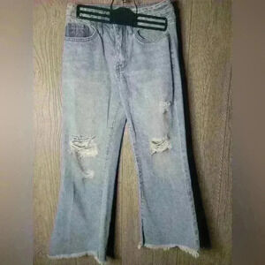 Women's YMI Dream authenic denim distressed jeans with holes. Size 1/25. Ligh